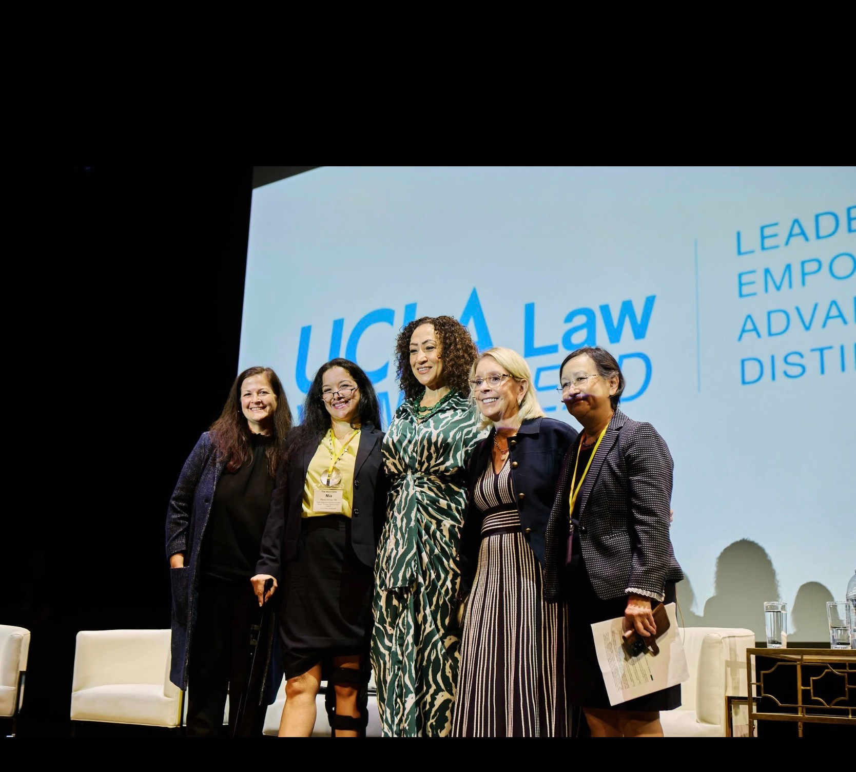 Mia Perez-Arroyo with fellow participants at an event with a UCLA Law backdrop